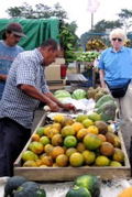 Fruit stand guy cutting guanabana
